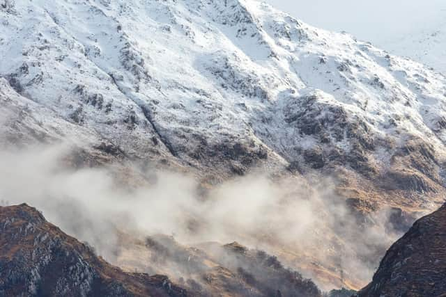 Loch Hourn from Knoydart, March 2019.
"This photograph is a favourite because it’s so epic. You get the scale of these great, almost brutal mountains and how they come down to the shore. I like how the granite is dissolved by the sea mist and that to me is a Scottish thing, how the physical stone gets dissolved by the moisture and how it looks visually. 
And I like the depth of it because you get the three layers receding and I find the tones so beautiful, the russets and greens and the little house in the foreground gives it scale.
You always wonder if you lived with such spectacular views if you’d eventually think, yeah, whatever, I’d like to see a Tesco."