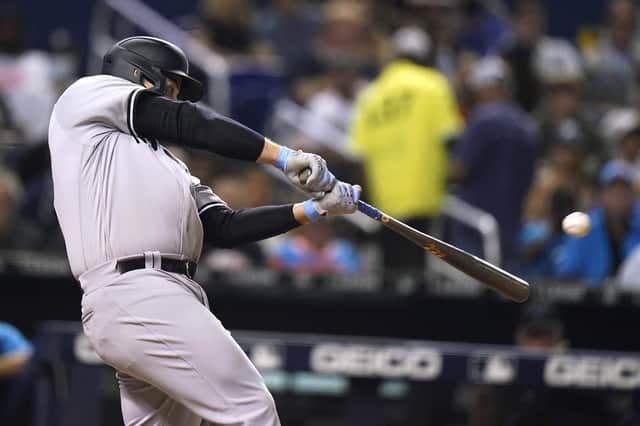 New York Yankees' Anthony Rizzo hits a solo home run against the Miami Marlins. Picture: Lynne Sladky/AP
