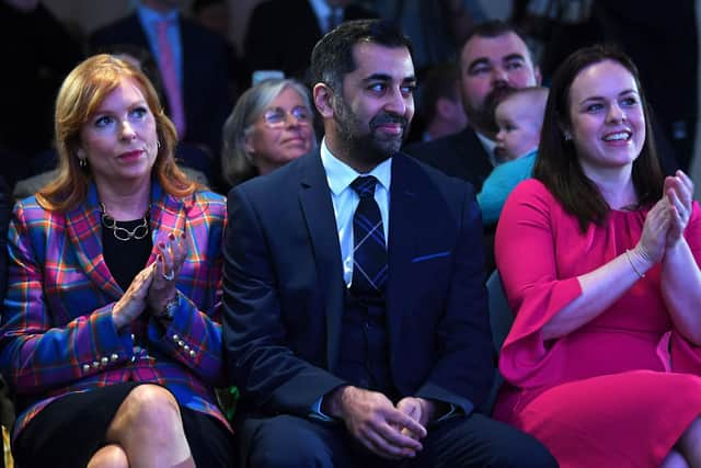 Ash Regan (L) Kate Forbes (R) applaud after Humza Yousaf was named as the party's new leader