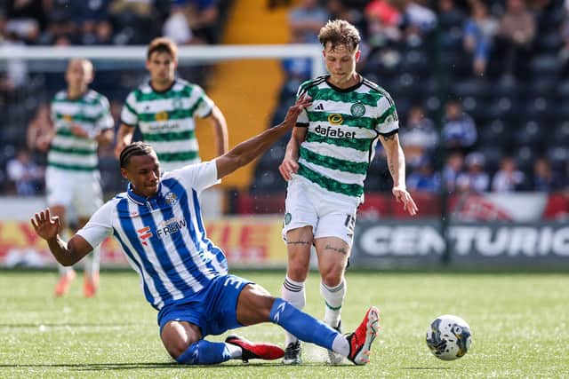 Kilmarnock's Corrie Ndaba challenges Celtic's Odin Thiago Holm. (Photo by Craig Williamson / SNS Group)
