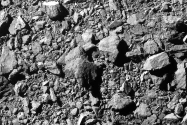 Handout photo issued by Nasa of the last complete image of asteroid moonlet Dimorphos, taken by the DRACO imager on NASA's DART (Double Asteroid Redirection Test) mission from 7 miles (12 kilometers) from the asteroid and 2 seconds before impact.