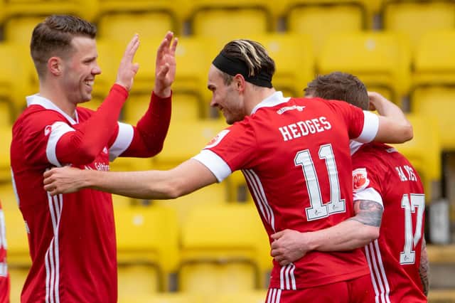 Aberdeen winger Ryan Hedges celebrates his goal four minutes after coming on against Livingston (Photo by Paul Devlin / SNS Group)