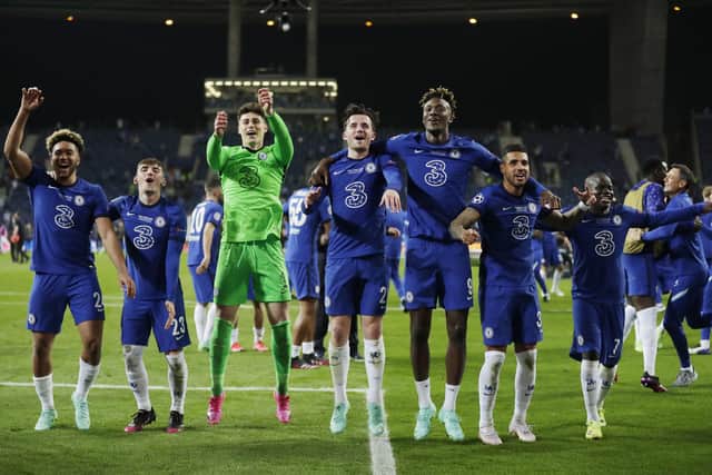 Players of Chelsea celebrate following victory during the UEFA Champions League Final between Manchester City and Chelsea FC at Estadio do Dragao on May 29, 2021 in Porto, Portugal. (Photo by Manu Fernandez - Pool/Getty Images)
