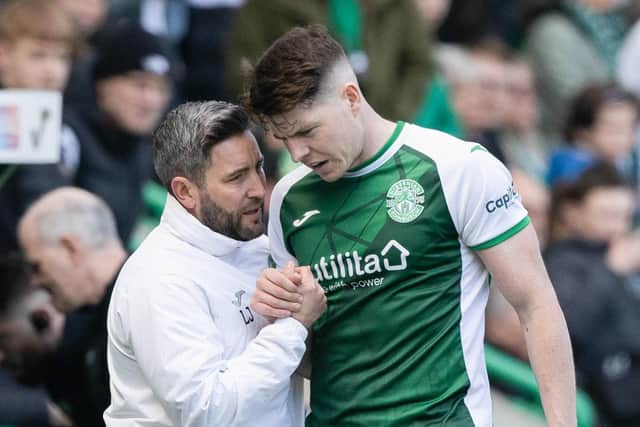 Hibs manager Lee Johnson speaks to Kevin Nisbet during the Premiership match between Hibs and Hearts at Easter Road in April. Photo by Craig Williamson/SNS Group