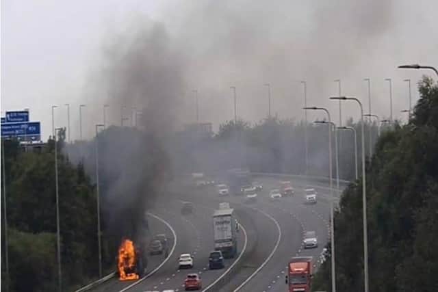 A First Glasgow bus was destroyed by fire on the M74 last August. Picture: Traffic Scotland
