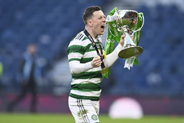 Callum McGregor celebrates another piece of silverware with Celtic.