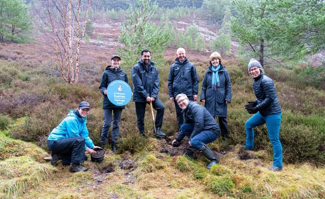 From left: Junior Rangers Katherine Parfitt and Anna Parfitt; First Minister Humza Yousaf, Sandy Bremner, CNPA Convener; Grant Moir, CNPA CEO; Ray Macfarlane, Scotland Committee Chair and a trustee and Deputy Chair of The National Lottery Heritage Fund, Lorna Slater, Minister for Green Skills, Circular Economy and Biodiversity.