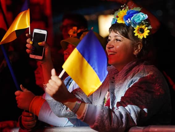 The crowd watching Kalush Orchestra, Eurovision winners from Ukraine, performing their first UK gig at Shangri-La's Truth Stage, during the Glastonbury Festival at Worthy Farm in Somerset. Picture date: Saturday June 25, 2022.