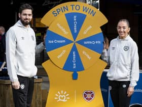 Craig Gordon and Georgia Hunter are pictured as Hearts unveil loveholidays as their official holiday parter at Waverley Station. (Photo by Mark Scates / SNS Group)