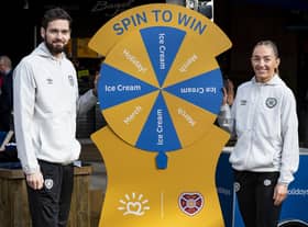 Craig Gordon and Georgia Hunter are pictured as Hearts unveil loveholidays as their official holiday parter at Waverley Station. (Photo by Mark Scates / SNS Group)