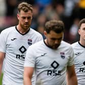 Ross County players look dejected after the 6-1 defeat to Hearts on Saturday that has left them in peril of relegation (Photo by Mark Scates / SNS Group)