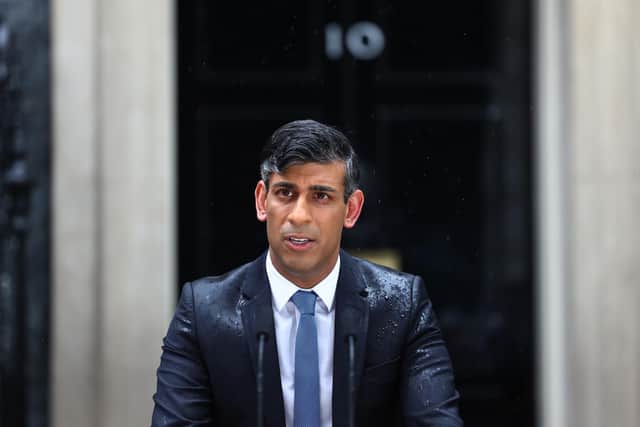 Rishi Sunak wasn't singing in the rain, but calling an election (Picture: Peter Nicholls/Getty Images)