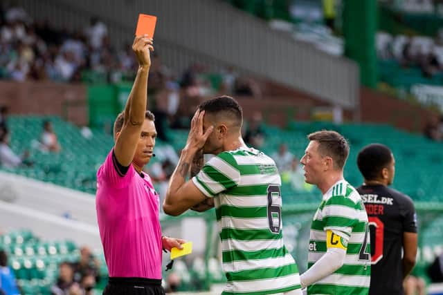 Celtic's Nir Bitton is red carded at the end of the first half.