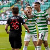 Celtic's Nir Bitton is red carded for an altercation with Anders Dreyer.