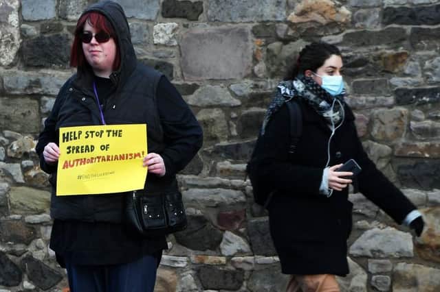 This protester outside the Scottish Parliament might agree with Brian Monteith that ongoing lockdowns are too much