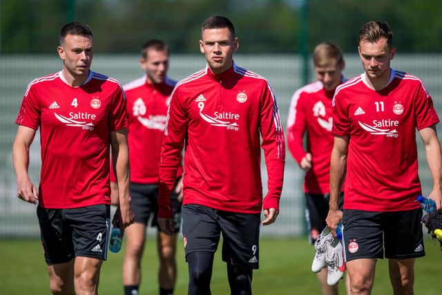 Andy Considine, Christian Ramirez and Ryan Hedges during an Aberdeen training session at Cormack Park.