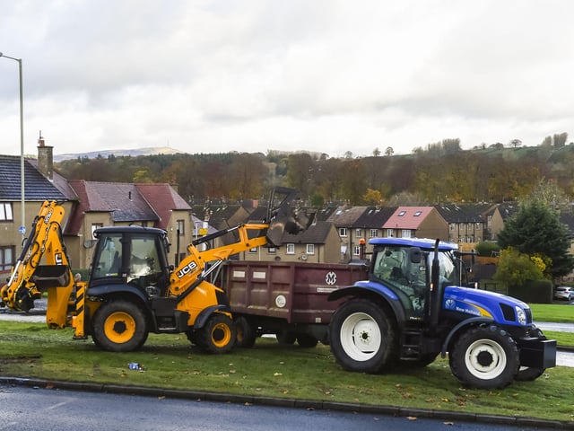 Riot police were called in after a group of youths blocked roads in Dundee with bonfires and hurled fireworks in the street.