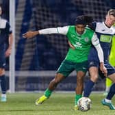 Hibs winger Jair Tavares and Raith's Arron Arnott in action during Lewis Vaughan's testimonial match at Stark's Park.  (Photo by Ross Parker / SNS Group)