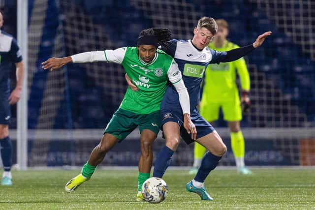 Hibs winger Jair Tavares and Raith's Arron Arnott in action during Lewis Vaughan's testimonial match at Stark's Park.  (Photo by Ross Parker / SNS Group)