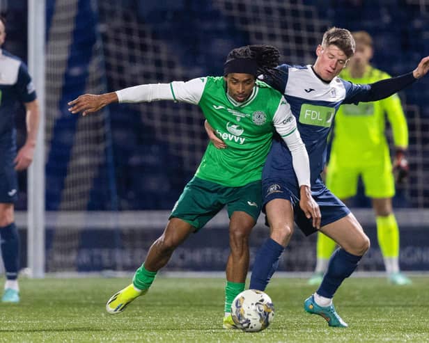 Hibs winger Jair Tavares and Raith's Arron Arnott in action during Lewis Vaughan's testimonial match at Stark's Park.  (Photo by Ross Parker / SNS Group)
