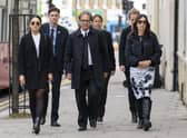 Molly Russell's father Ian Russell (centre), mother Janet Russell (right) and her sister (left) arrive at Barnet Coroner's Court in north London on the first day of the inquest into her death. Picture: Kirsty O'Connor/PA Wire