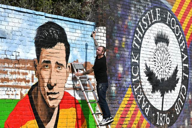 Artist, Bobby McNamara AKA Rogue Oner works on the Jags' mural. Picture: John Devlin.