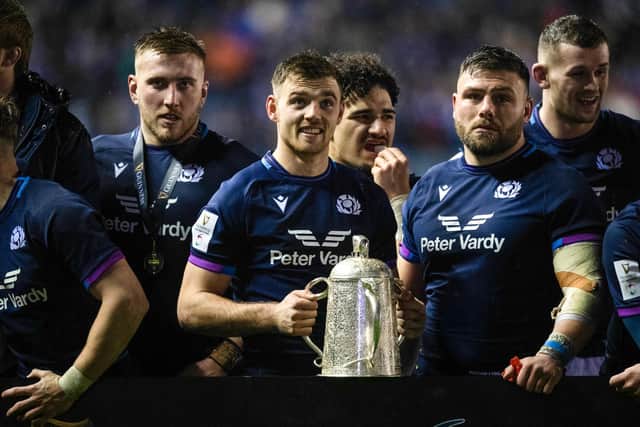 Ben White gets his hands on the Calcutta Cup at full-time.  (Photo by Ross MacDonald / SNS Group)