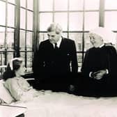 Aneurin Bevan (second left) talks to the NHS's first patient, Sylvia Diggory, 13, at Trafford General on 5 July, 1948