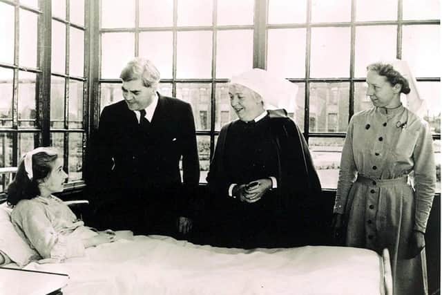 Aneurin Bevan (second left) talks to the NHS's first patient, Sylvia Diggory, 13, at Trafford General on 5 July, 1948