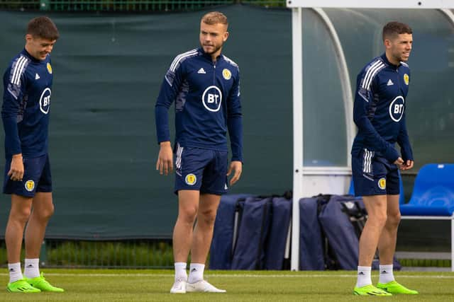 Aaron Hickey, Ryan Porteous and Ryan Christie during a Scotland training session. Photo by Craig Williamson / SNS Group