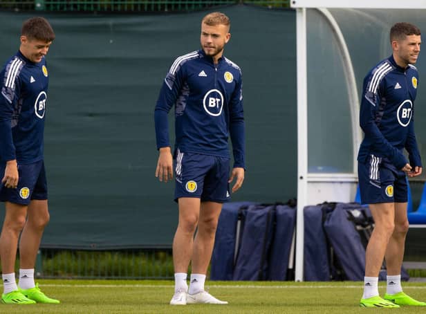 Aaron Hickey, Ryan Porteous and Ryan Christie during a Scotland training session. Photo by Craig Williamson / SNS Group
