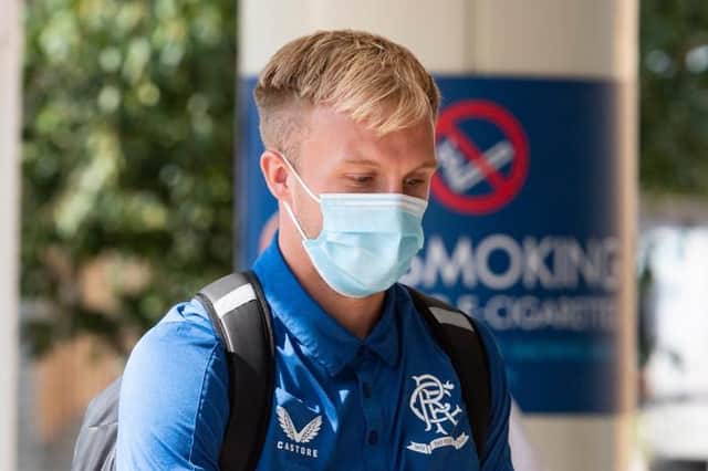 Goalkeeper Robby McCrorie, pictured at Glasgow Airport on Wednesday, is poised to make his first team debut for Rangers in their Europa League tie with Alashkert in Yerevan on Thursday evening. (Photo by Mark Scates / SNS Group)