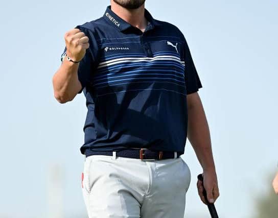 Ewen Ferguson celebrates after holing his title-winning birdie putt on the 72nd hole. Picture: Stuart Franklin/Getty Images.