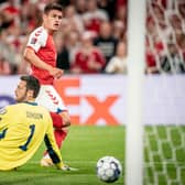 Denmark's Joakim Mahle slips the ball past Craig Gordon to put his sid 2-0 up. (Photo by MADS CLAUS RASMUSSEN/Ritzau Scanpix/AFP via Getty Images)