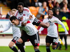 Aberdeen's Bojan Miovski (C) celebrates scoring the opener in the 2-1 win over Motherwell. (Photo by Craig Foy / SNS Group)
