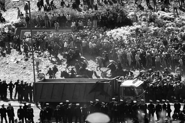 NUM pickets clash with mounted police when they try to prevent coal leaving Hunterston power station for Ravenscraig steelworks during the miners strike in May 1984. Boris Johnson faced a backlash this week after joking Margaret Thatcher's shutdowns in the 1980s gave the UK a "big early start" in fighting climate change PIC: Allan Milligan.