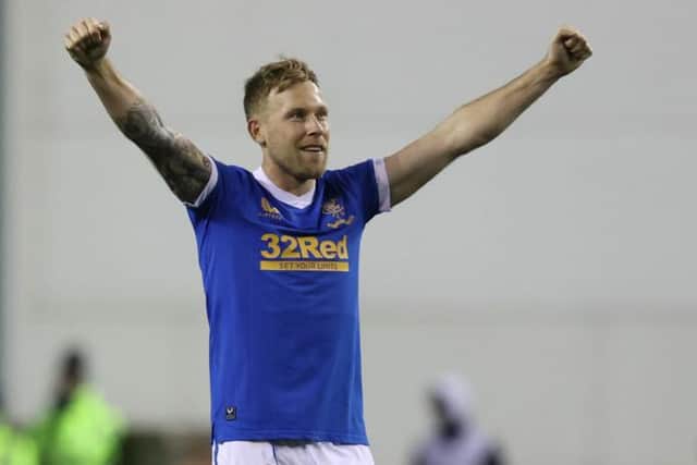 Rangers midfielder Scott Arfield is relishing the prospect of landing a glamour tie in Monday's Europa League knockout round play-off draw. (Photo by Craig Williamson / SNS Group)