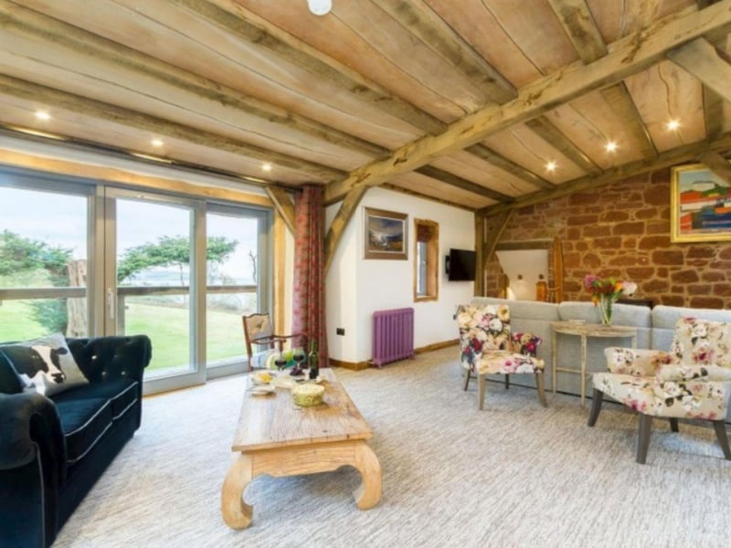 The upper living room has views over the Ayrshire countryside.