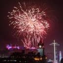 Fireworks explode over Edinburgh Castle and the Balmoral Clock during the street party for Hogmanay New Year celebrations in Edinburgh. Picture: Jane Barlow/PA Wire
