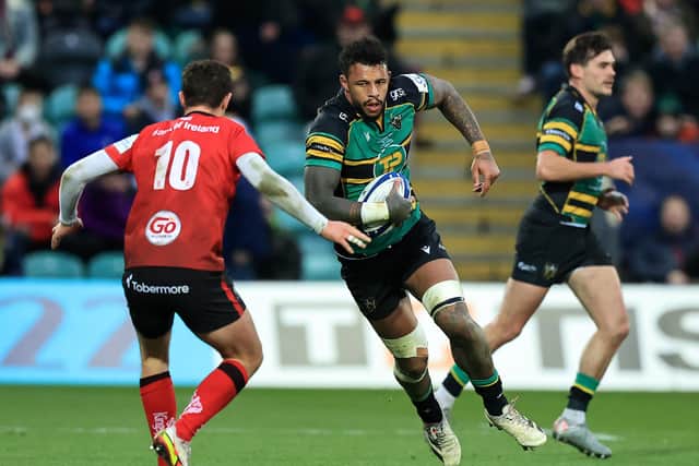Courtney Lawes of Northampton Saints takes on Billy Burns against Ulster Rugby.
