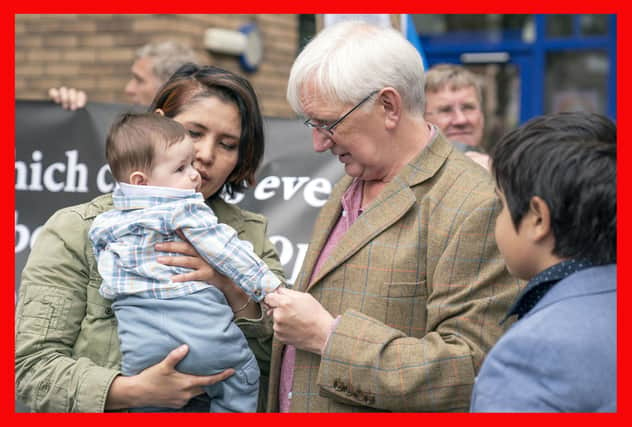 Blogger Craig Murray says goodbye to his wife Nadira and five-month-old son Oscar before handing himself into St Leonard's Police Station, Edinburgh. He has been sentenced to eight months in prison after judges ruled his blog coverage of former Scottish first minister Alex Salmond's trial could identify four women involved in the case.  PIC: Jane Barlow/PA Wire