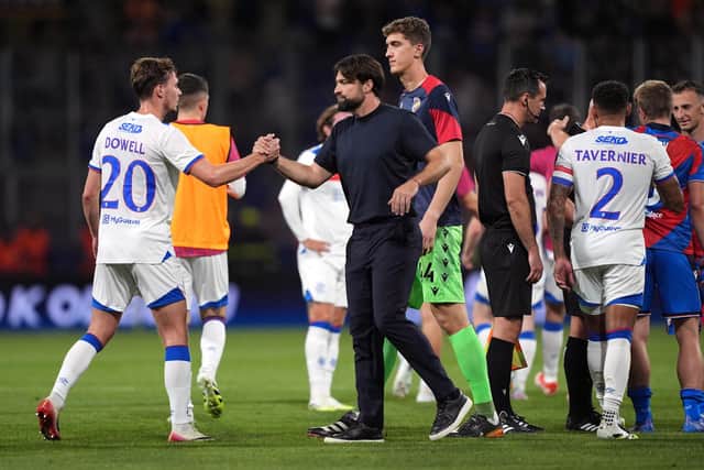Rangers manager Russell Martin shakes hands with Kieran Dowell following Wednesday's defeat in their Champions League qualifier against Viktoria Plzen. Rangers lost 2-1 but went through 4-2 on aggregate. (Photo by Gabriel Kuchta/Getty Images)