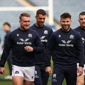 Scotland captain Stuart Hogg is flanked in training by Finn Russell, left, and Ali Price.  (Photo by Craig Williamson / SNS Group)