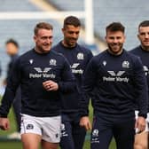 Scotland captain Stuart Hogg is flanked in training by Finn Russell, left, and Ali Price.  (Photo by Craig Williamson / SNS Group)