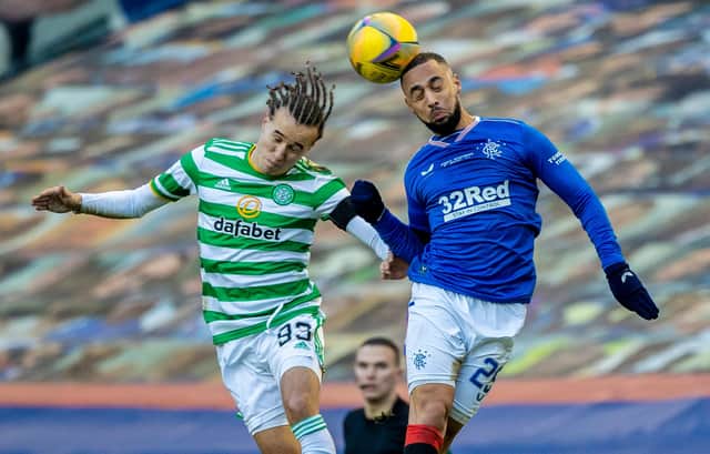 Celtic's Diego Laxalt and Rangers Kemar Roofe in an aerial challenge during the clubs' last derby, at Ibrox in January. (Photo by Craig Williamson / SNS Group)