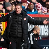 Barry Robson, Aberdeen's interim boss, had his name sung by the Dons support. (Photo by Paul Byars / SNS Group)