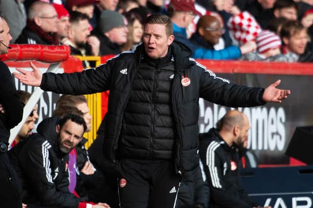 Barry Robson, Aberdeen's interim boss, had his name sung by the Dons support. (Photo by Paul Byars / SNS Group)