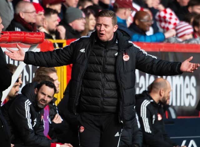 Barry Robson, Aberdeen's interim boss, had his name sung by the Dons support. (Photo by Paul Byars / SNS Group)