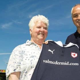 Pictured in 2015, Val McDermid with former manager Ray McKinnon at the unveiling of a Raith Rovers new strip. Picture: SNS