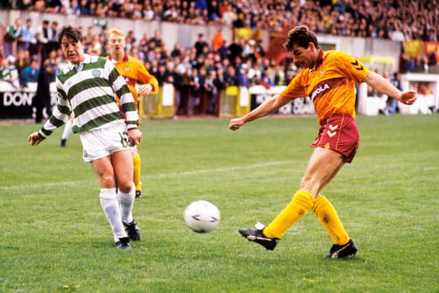 Motherwell defender John Philliben (right) clears his line against Celtic's Gerry Creaney in a 3-1 defeat in October 1992